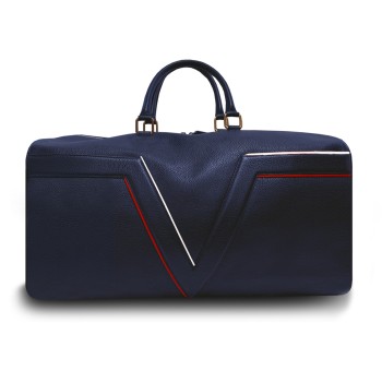 Le sac de voyage BréVent, élégant et fonctionnel, dans sa version en cuir bleu, liseré rouge et blanc.