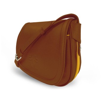 Le sac à main Vens, intemporel et indispensable, dans sa version en cuir cognac, liseré jaune.