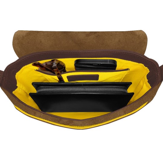 Intérieur sac à main nubuck cognac liseré orange.