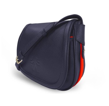 Le sac à main Vens, intemporel et indispensable, dans sa version en cuir bleu, liseré rouge.