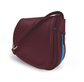 Le sac à main Vens, intemporel et indispensable, dans sa version en cuir bordeaux, liseré bleu.