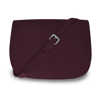 Notre Besace SaVine, en quête de praticité et de style minimaliste dans sa version en cuir rouge bordeaux, liseré bleu