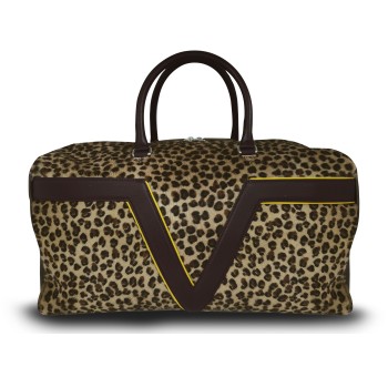 Le sac de voyage BréVent, élégant et fonctionnel, dans sa version léopard, liseré jaune.