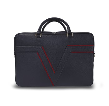 Le porte documents ClairVaux, la référence de notre gamme business, dans sa version en cuir bleu, liseré rouge.