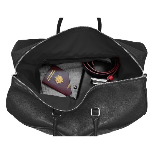 Intérieur sac de voyage cuir noir V léopard liseré jaune.