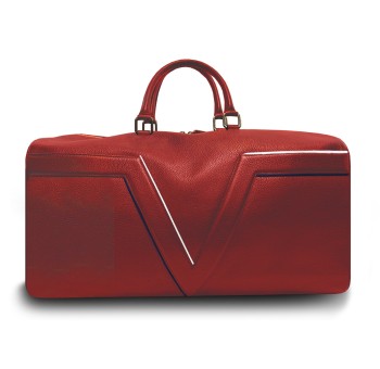 Le sac de voyage BréVent, élégant et fonctionnel, dans sa version en cuir rouge, liseré bleu blanc.